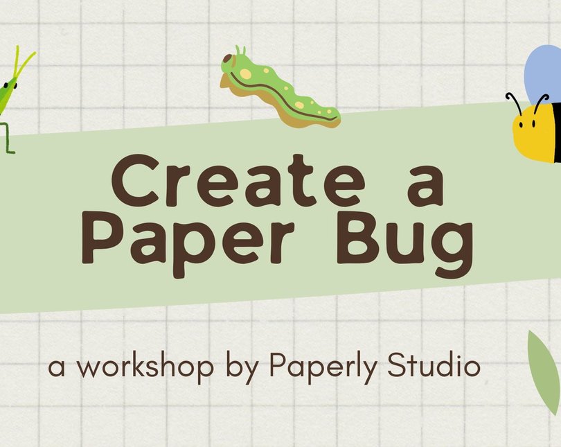 A grid background with a caterpillar on top of a green box and text 'Create a Paper Bug'