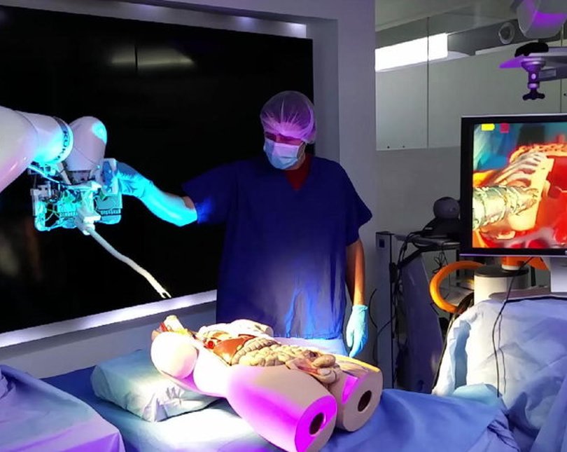 Photo of a doctor using robotics in a simulated surgery
