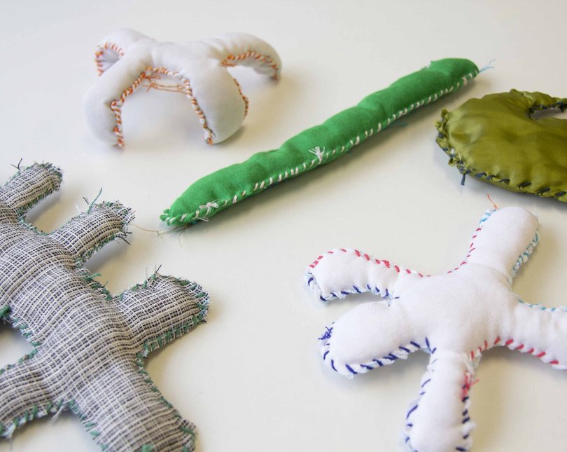Small stuffed shapes sewn together