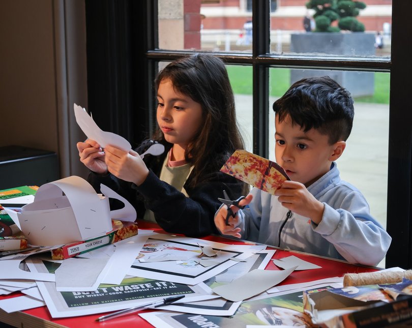 Two children making crafts