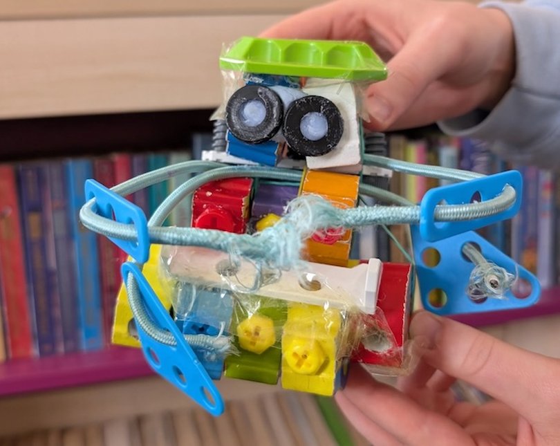 Colourful robot toy made from household materials