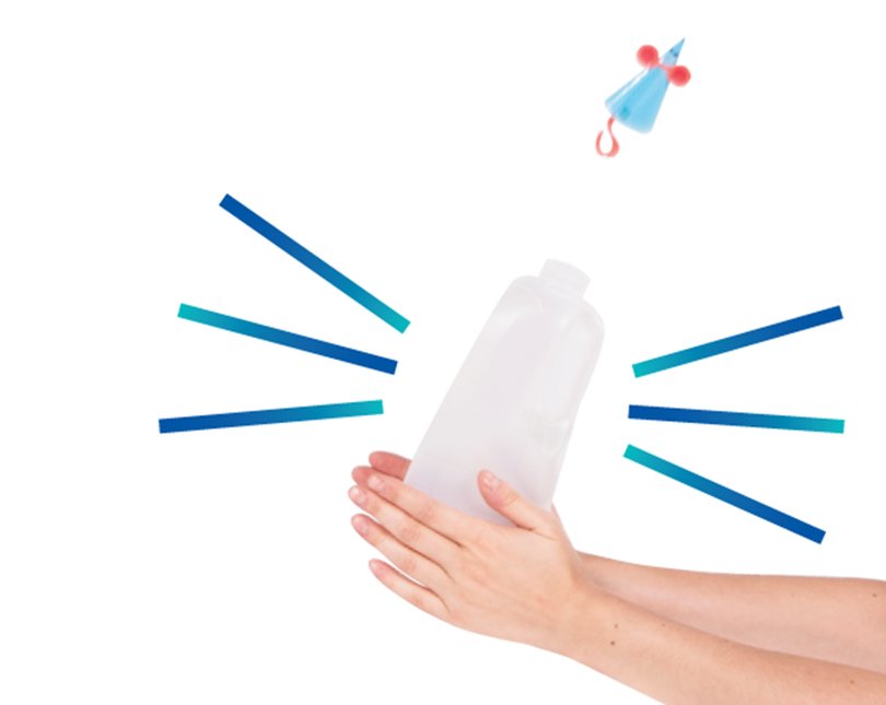 Hands squeezing a bottle with a small fake mouse flying out