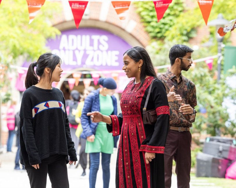 Women takes adds card to display