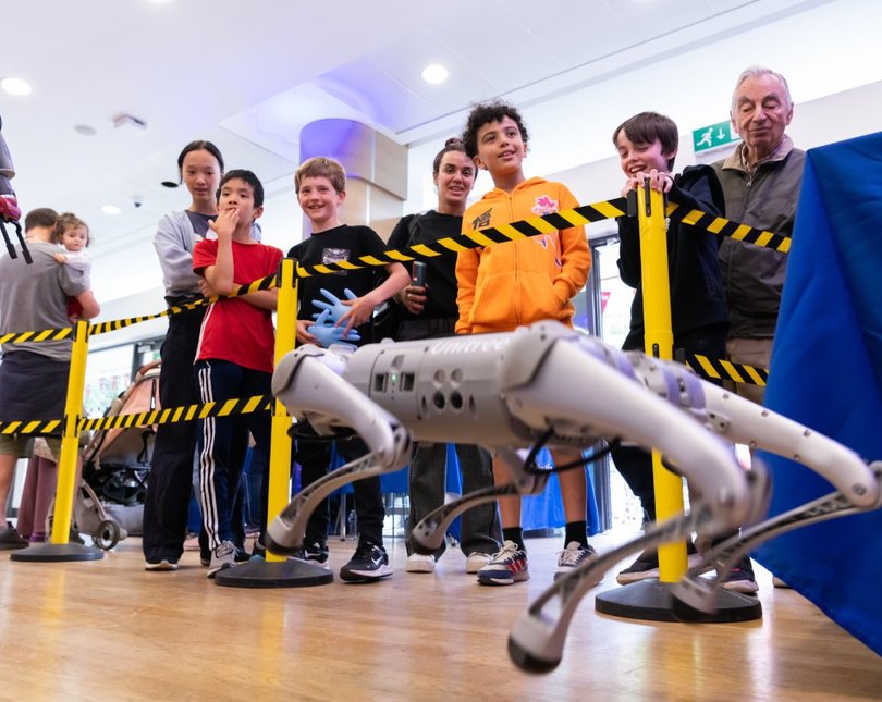 Robot dog in front of a crowd